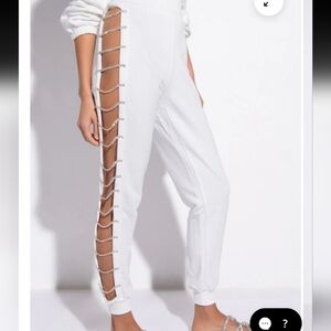 AKIRA Stop Callin Me Rhinestone Joggers White | Cutout Crystal Lace Up Sides